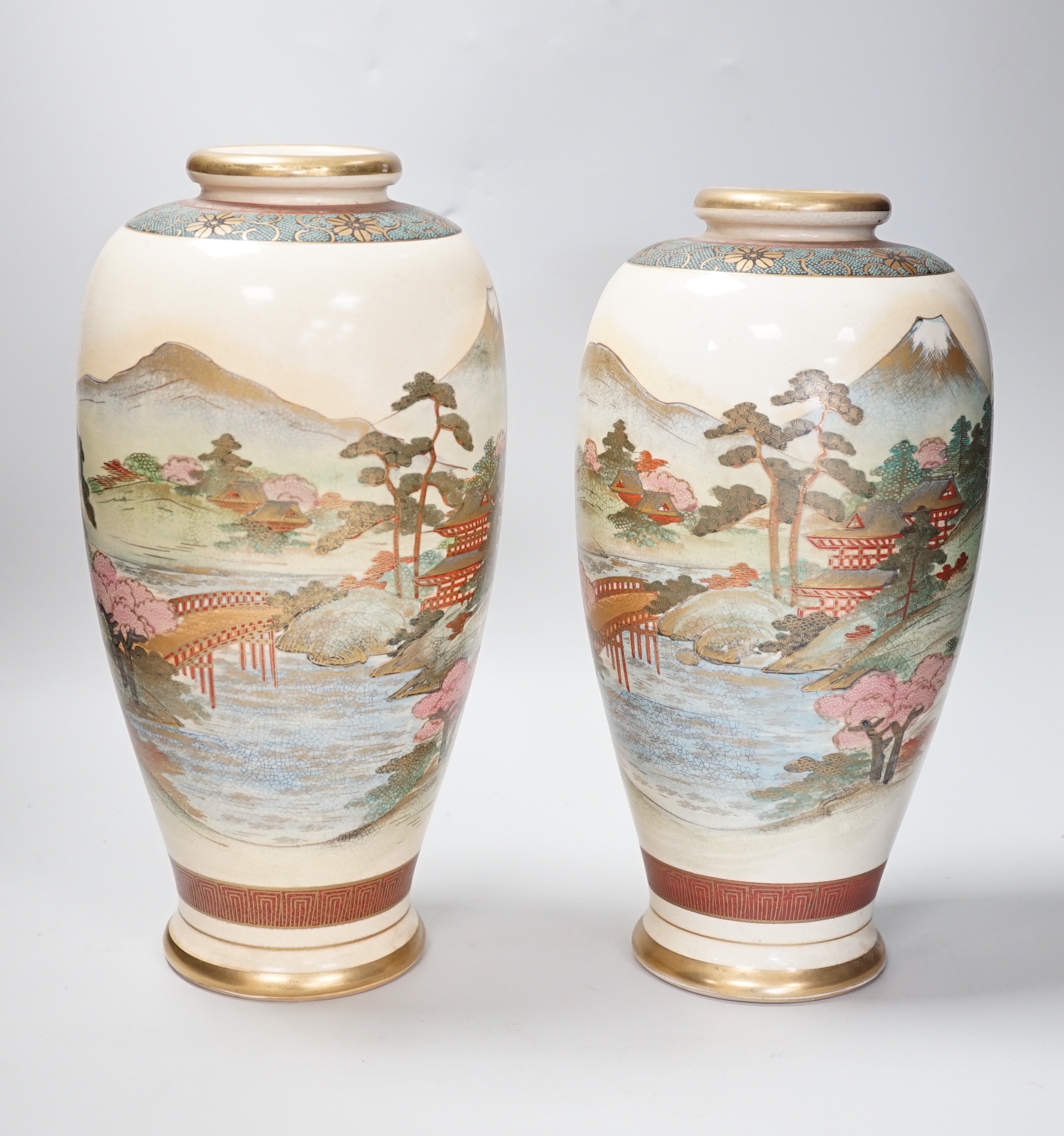 A near pair of Japanese Satsuma 'Mount Fiji' vases, 30cm
